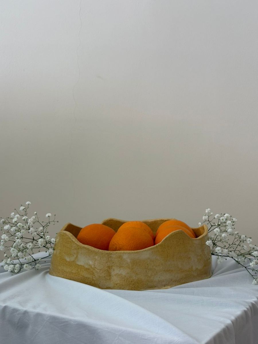 Honey bowl with oranges